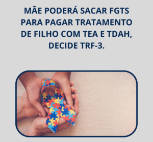 Mãos segurando o símbolo do austismo.